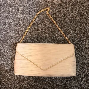 Elegant Cream Clutch with Gold Chain